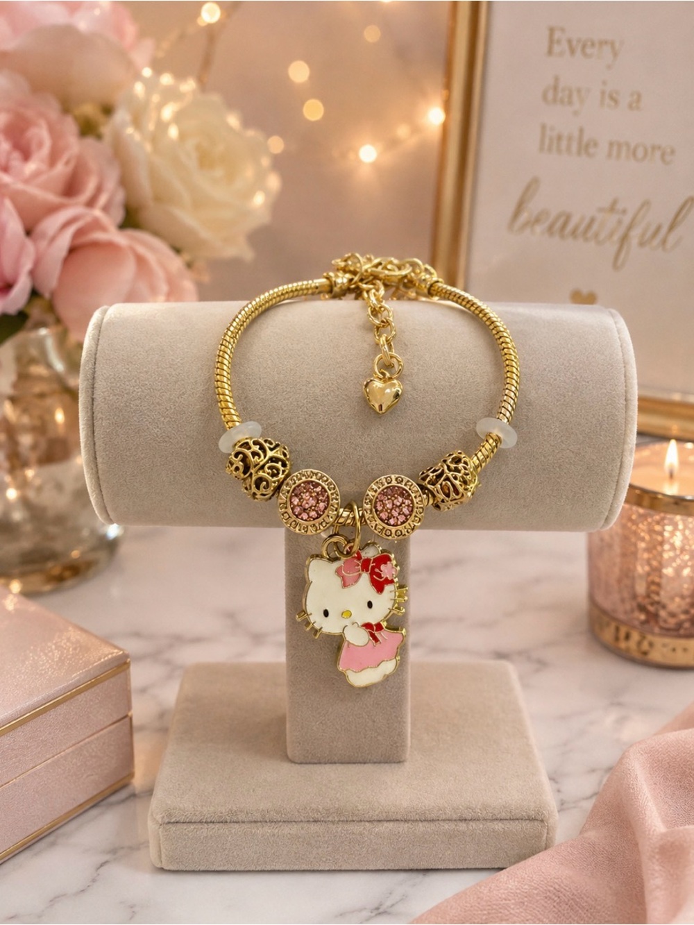 Gold Hello Kitty Charm Bracelet with Pink Accents Size 6